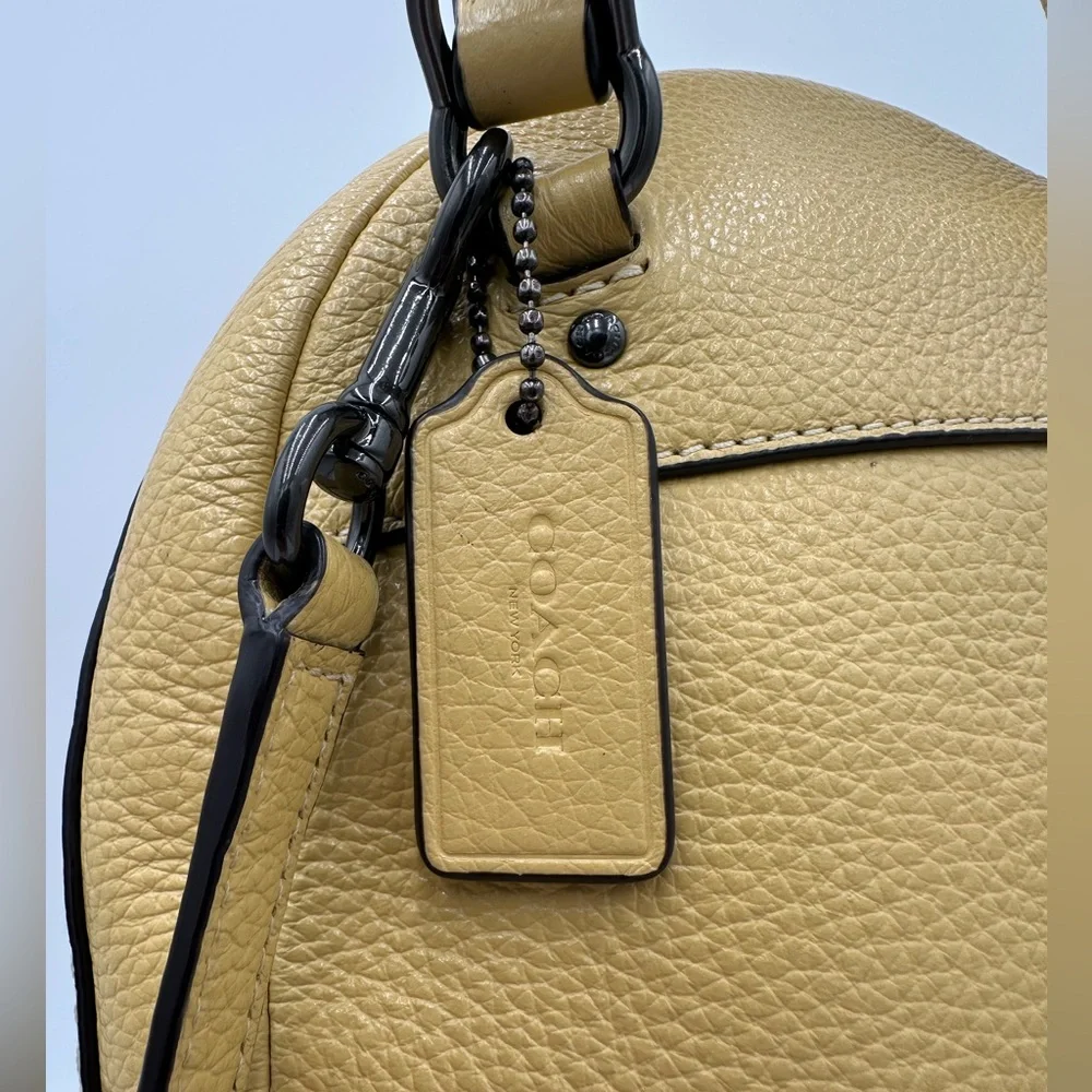 EUC Coach Andi Convertible Backpack with Structured Design. Metallic Hardware.